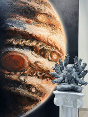 Jupiter original fluid painting by YIFAN ZHANG shown beside a separate astronaut sculpture